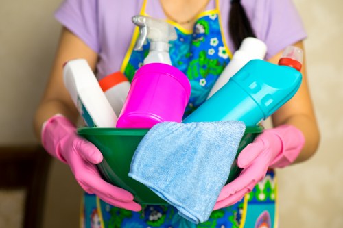 Commercial cleaner preparing office surfaces in Finsbury Park